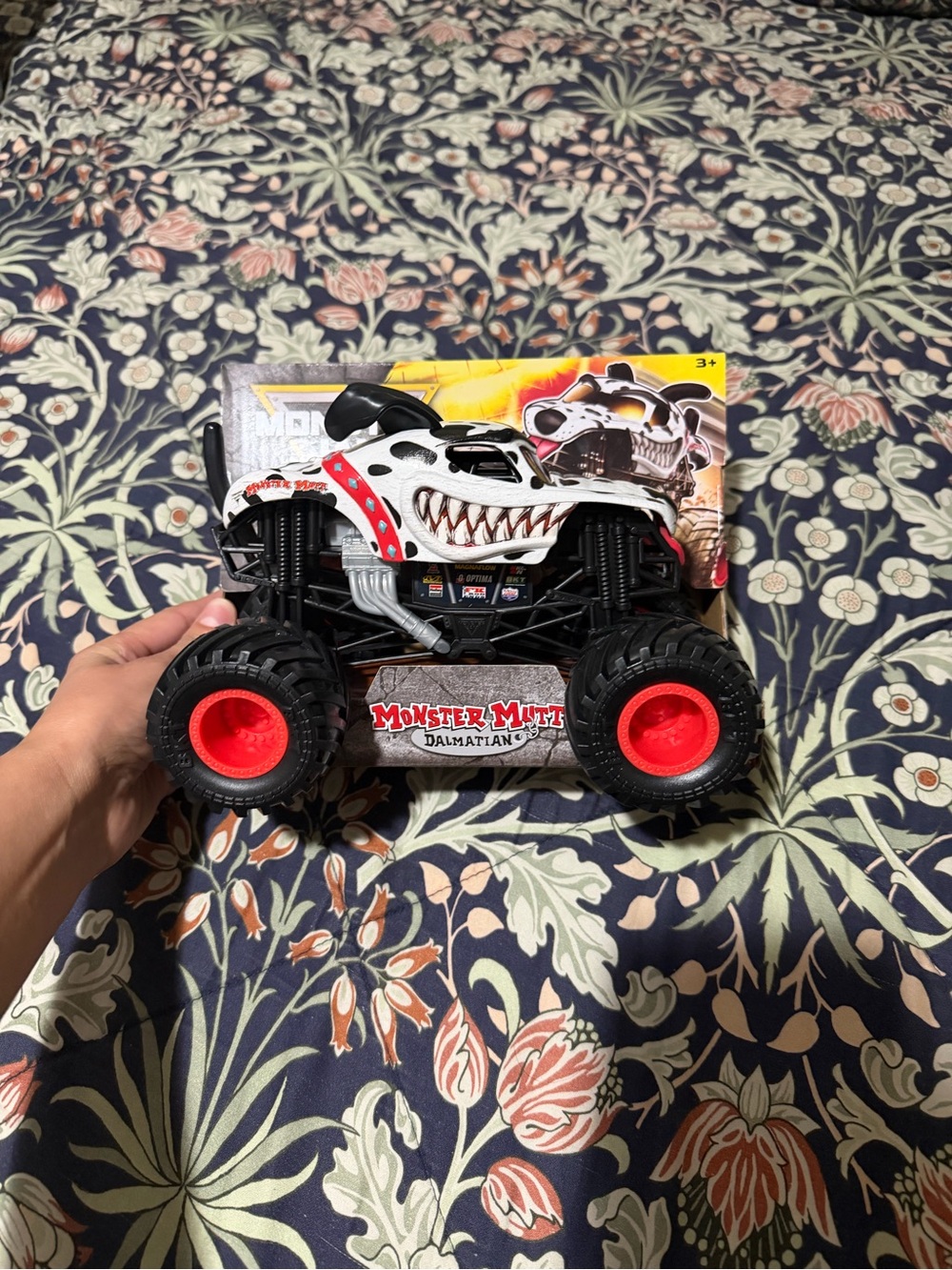 Monster Mutt Dalmatian Monster Truck Toy - White and Black with Red Wheels